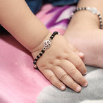 Load image into Gallery viewer, 925 Silver Kids Bracelet with Swastik Charm &amp; Black Beads (Adjustable)
