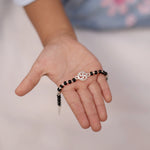 Load image into Gallery viewer, 925 Silver Kids Bracelet with Swastik Charm &amp; Black Beads (Adjustable)
