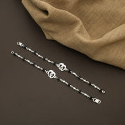 Silver Kids Bracelet with Baby Feet Charm & Black Beads